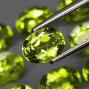 Dazzling 7.53ct untreated apple green Peridot set