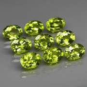 Dazzling 7.53ct untreated apple green Peridot set