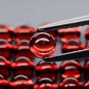 Incredible 8.96ct open color Mozambique Garnet cabochon set