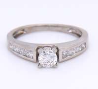 Dazzling White Gold Round Brilliant Cut Diamond Channel Set Bridal Set