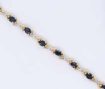 Fantastic Yellow Gold Oval Blue Sapphire and Diamond X Bracelet