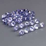 Heavy flashing 3.26ct diamond cut Tanzanite set