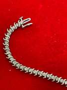 14K WHITE GOLD AND DIAMOND S LINK TENNIS BRACELET