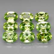 Dazzling 7.37ct untreated apple green Peridot set