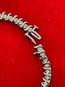 14K WHITE GOLD AND DIAMOND S LINK TENNIS BRACELET