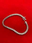 14K WHITE GOLD AND DIAMOND S LINK TENNIS BRACELET