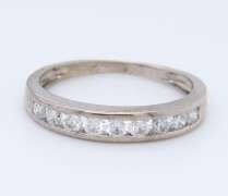 Dazzling White Gold Round Brilliant Cut Diamond Channel Set Bridal Set