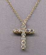 TIFFANY AND CO. 18K GOLD AND DIAMOND CROSS PENDANT