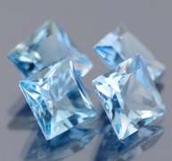 Vivid! 21.21ct radiant cut Swiss blue Topaz set