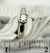 Contemporary 14K White Gold Bezel-Set 1/2 Ct. Solitaire Diamond