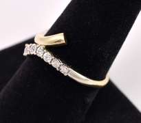 Dazzling Diamond Bypass Ring in Yellow Gold