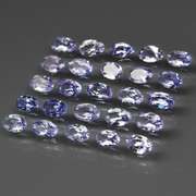 Glittering 5.28ct bright blue violet Tanzanite set