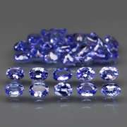 Glittering 5.30ct bright blue violet Tanzanite set