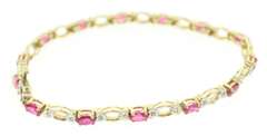 LADIES RUBIES AND DIAMOND GOLD BRACELET.