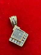 14K YELLOW GOLD PENDANT WITH 0.75 CARAT OF DIAMONDS