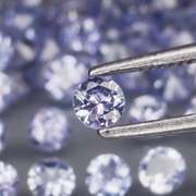 Heavy flashing 3.23ct diamond cut Tanzanite set