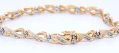 Majestic Yellow Gold Baguette and Diamond Crossover Bracelet