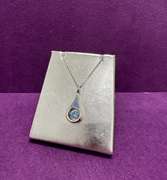 Sterling silver with large fancy blue pendant