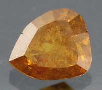 Stunning .56ct pear cut red orange Diamond