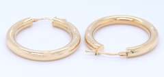 Beautiful Yellow Gold oval Tube Hoop Earrings