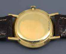 Stately Mathey Tissot Liberty Coin Men's 18K G Watch