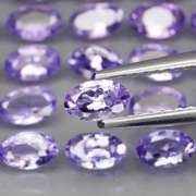 Glittering 5.19ct bright blue violet Tanzanite set