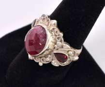 Enhanced Ruby Flanked By Garnets Set In Sterling Ring