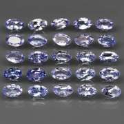Glittering 5.28ct bright blue violet Tanzanite set