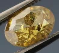 Incredible .69ct oval cut golden Diamond