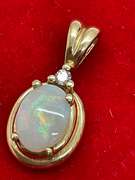 14K YELLOW GOLD OPAL AND DIAMOND PENDANT