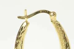 14K Yellow Gold Diamond Cut Retro Puffy Twist Oval Hoop Earrings