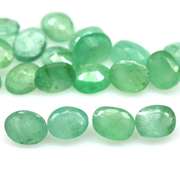 Bright emerald green 6.56ct 20pc emerald set