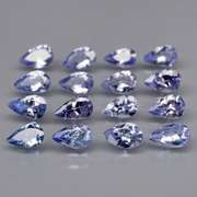 Heavy flashing 3.24ct pear cut Tanzanite set