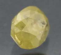 Eye catching .57ct oval cut yellow Diamond