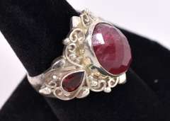 Enhanced Ruby Flanked By Garnets Set In Sterling Ring