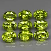 Dazzling 7.53ct untreated apple green Peridot set