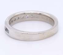 Delightful Platinum Channel Set Princess Cut Band