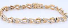 Majestic Yellow Gold Baguette and Diamond Crossover Bracelet