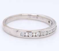Sparkling White Gold Baguette and Round Diamond Channel Set Band