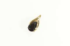 14K Yellow Gold Pear Black Onyx Diamond Accent Wavy Pendant