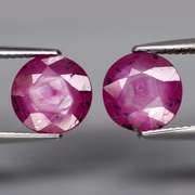 Stunning 6.78ct pinkish violet unheated Ruby pair