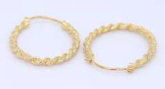Charming Yellow Gold Twisted Hoop Earrings