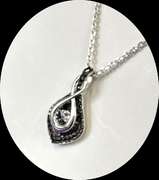 Solid sterling silver Infinity shape Dancing Stone pendant