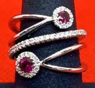UNUSUAL 18K WHITE GOLD RUBY AND DIAMOND RING