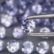 Heavy flashing 3.56ct diamond cut Tanzanite set