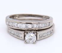 Dazzling White Gold Round Brilliant Cut Diamond Channel Set Bridal Set