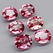 Amazing 4.46ct oval cut violet red Garnet set