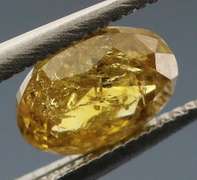 Incredible .69ct oval cut golden Diamond