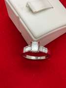 CERTIFIED LADIES PLATINUM AND DIAMOND RING