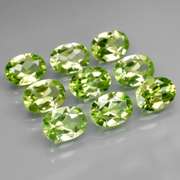 Dazzling 7.37ct untreated apple green Peridot set